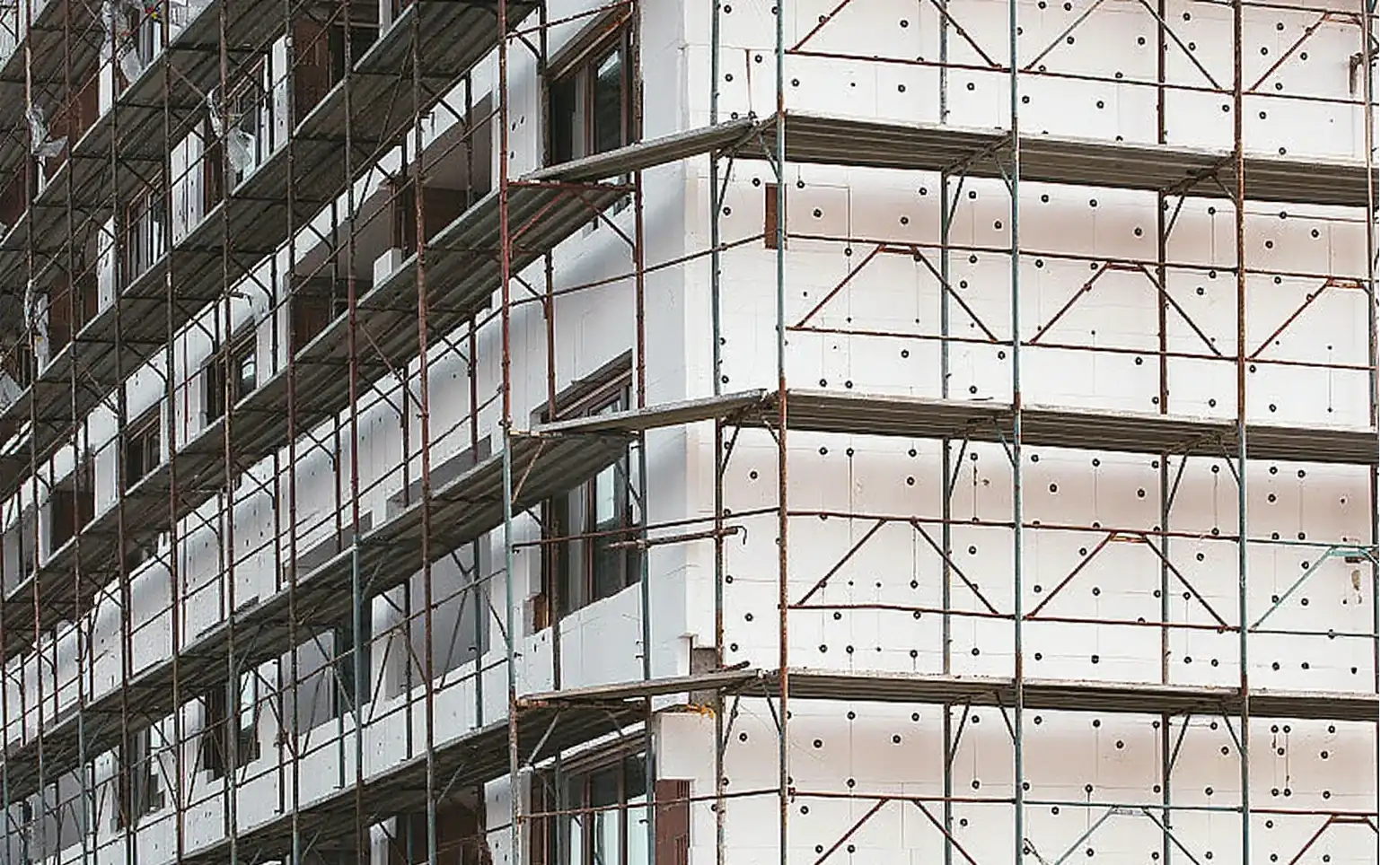 Building Under Construction with Polystyrene Foam Beads Insulation