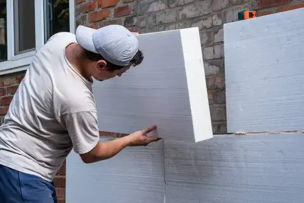 Installing EPS Insulation Boards on a Wall